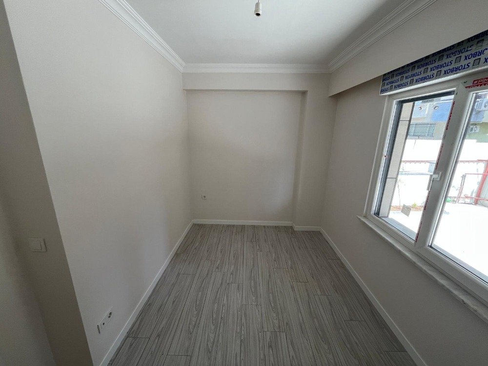 İKİZYUVA GAYRİMENKULDEN GENİŞ 1+1 MERKEZİ KONUMLU SATILIK DAİRE